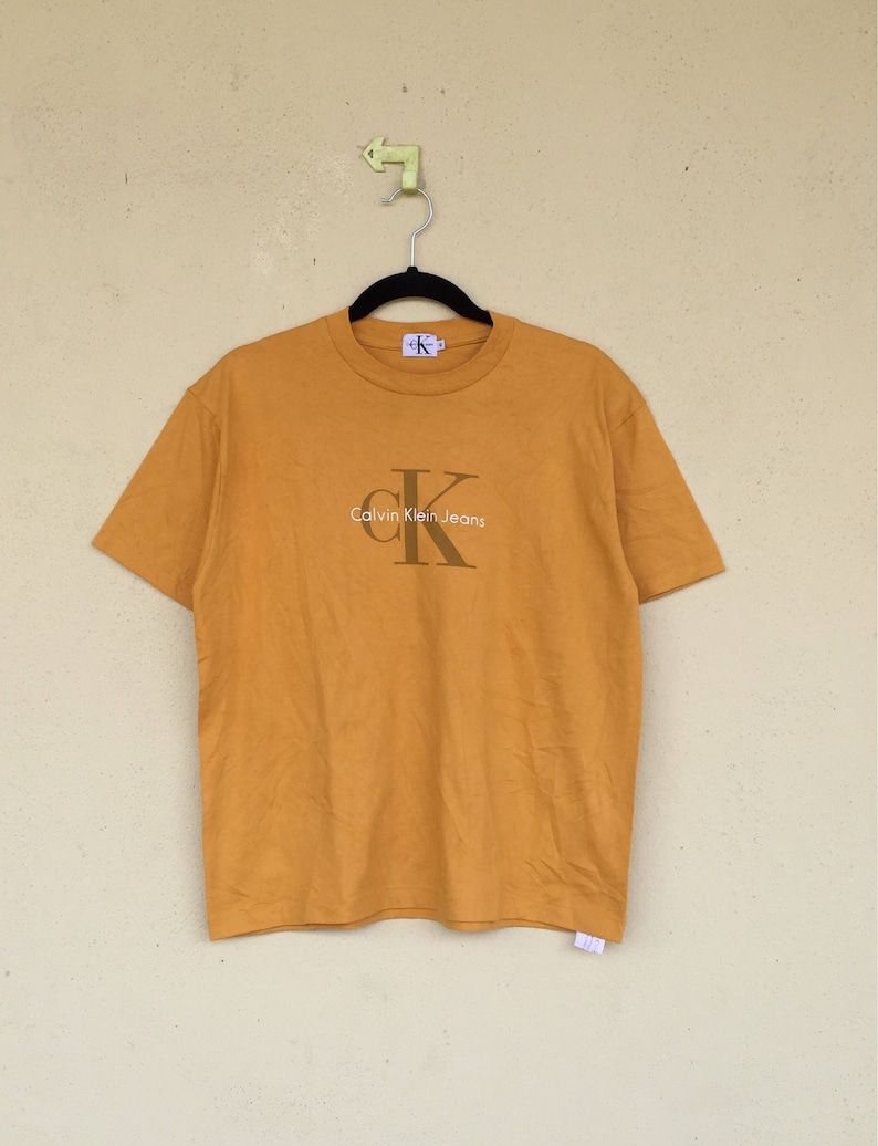 Calvin Klein Jeans Big Logo Spell Out Calvien Klein Unisex Clothing