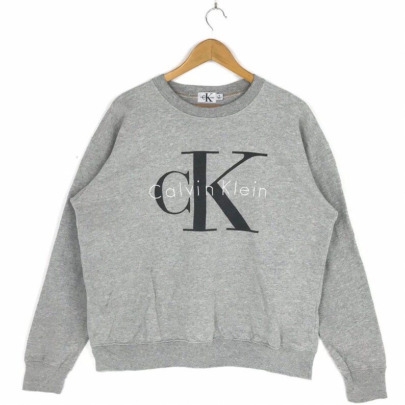 Rare Vintage Calvin Klein Jeans Spellout Big Logo Sweatshirt Fashion Style Streetwear Jumper Pullover Medium Size Sweater 90S