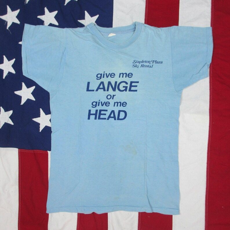 vintage 1970s give me lange or give me head ski joke t shirt xs small baby blue stapleton plaza humor winter sports aspen colorado wvglw