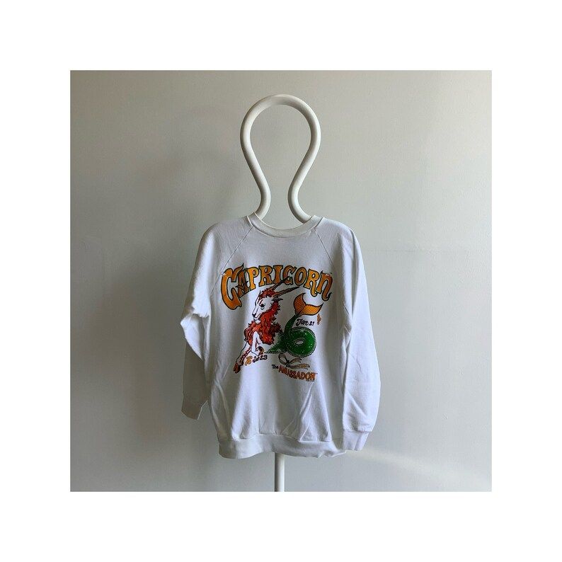 Vintage 1987 Capricorn Super Cool Graphic Sweatshirt With A Spattering Of Yellow Staining