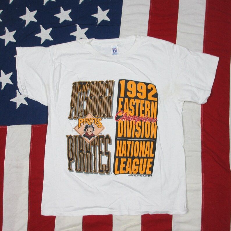 Vintage 1990S Pittsburgh Pirates 1992 Eastern Division Nl Champions Graphic T Shirt Medium Large Logo 7 White Black Gold Bucs Old Logo vintage 1990s pittsburgh pirates 1992 eastern division nl champions graphic t shirt medium large logo 7 white black gold bucs old logo