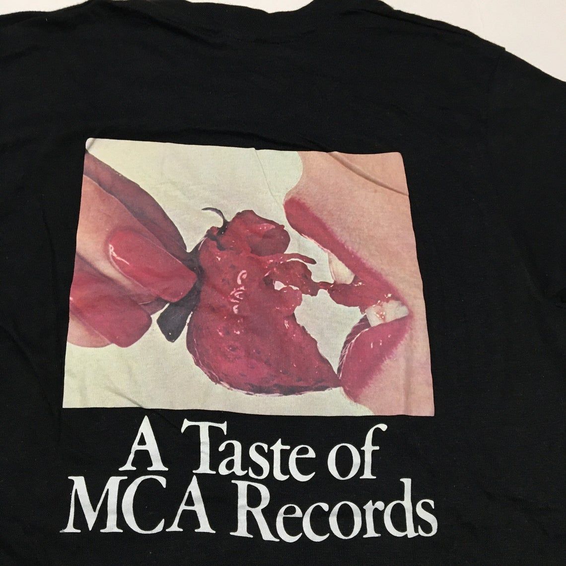 Vintage 70s MCA Records Bite Into It shirt