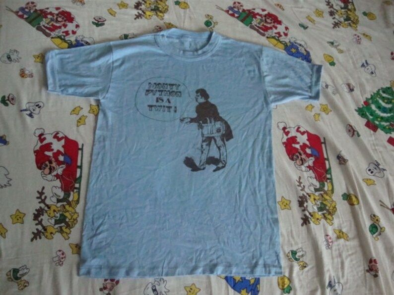 Vintage 70S Monty Python Is A Twit Funny British Comedy Bbc Punk Rock England T Shirt