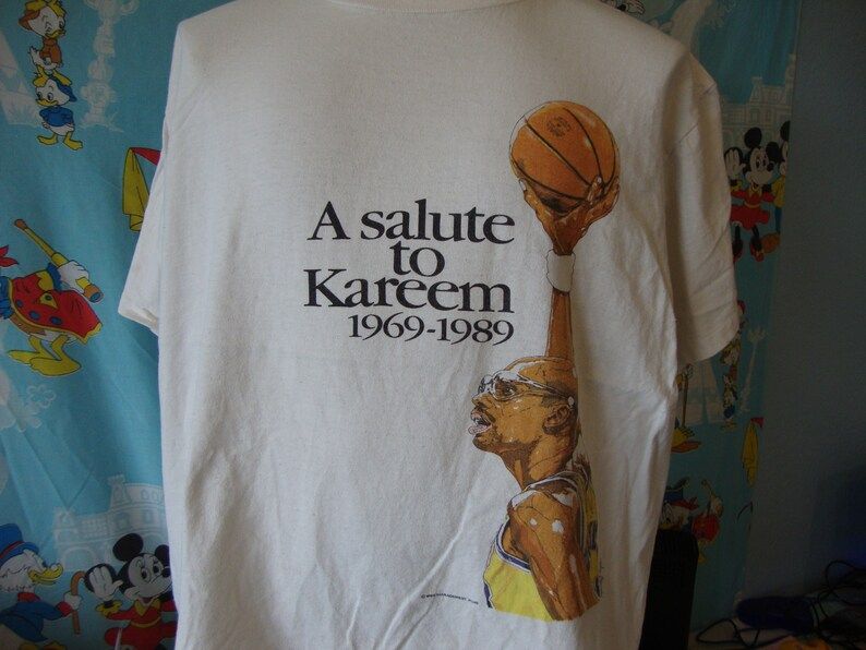 Vintage 80S A Salute To Kareem Abdul Jabbar Los Angeles Lakers Vs Dallas Mavericks 1989 Sky Hook Reunion Arena T Shirt vintage 80s a salute to kareem abdul jabbar los angeles lakers vs dallas mavericks 1989 sky hook reunion arena t shirt rsg5b