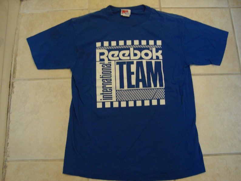 Vintage 80S Reebok Apparel International Team Blue T Shirt