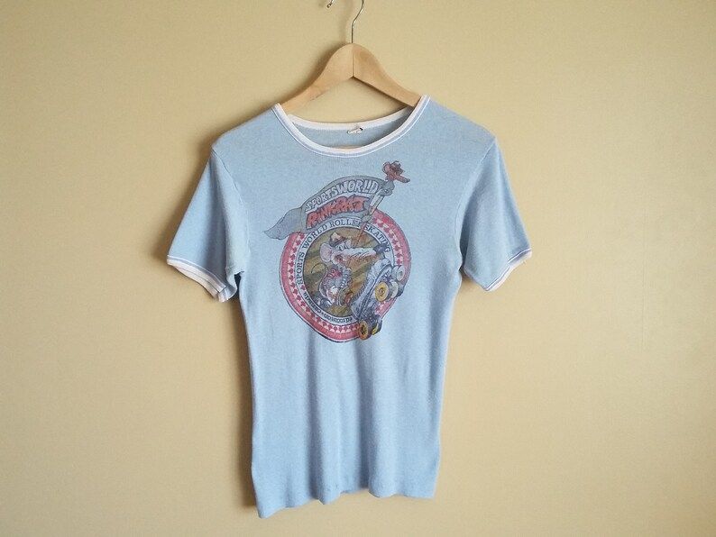 Vintage 80S Sports World Rink Rat Baby Blue Ringer T Shirt Edium 50 50 Made In Canada Super Stretchy Rib Knit Roller Girl