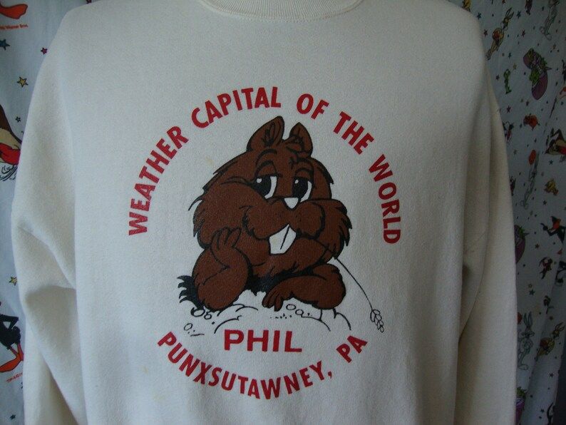 Vintage 90S Punxsutawney Phil Pennsylvania Groundhog Day Weather Capital Of The World Crew Neck Weather Man Forecaster Sweatshirt vintage 90s punxsutawney phil pennsylvania groundhog day weather capital of the world crew neck weather man forecaster sweatshirt rhmon