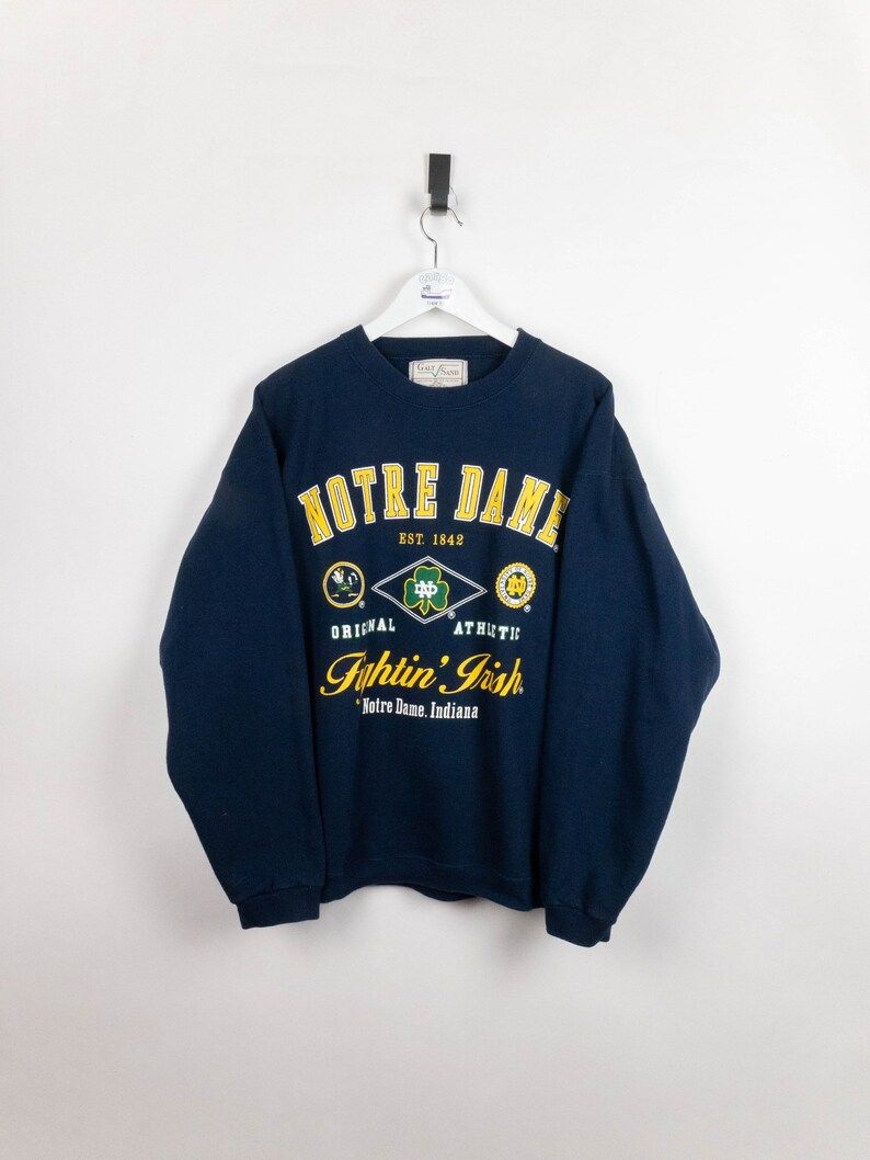 Vintage 90S University Of Notre Dame Fighting Irish Crewneck Sweatshirt vintage 90s university of notre dame fighting irish crewneck sweatshirt r21aw